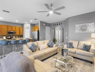 Embrace tranquility in our open-concept living room, where comfort meets contemporary elegance.