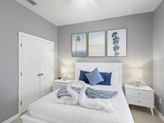 Drift into seaside dreams in this queen bedroom, your personal nook of calm and comfort.