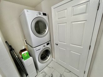 High efficiency washer and dryer, laundry detergent provided.