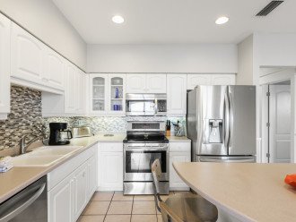 Equipped with Sleek Stainless Steel Appliances