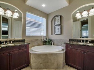 Master Bath w/ separate vanities, soaking tub & shower