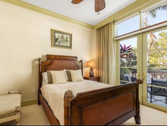 Guest bedroom with French doors to lanai overlooking 5th Ave South