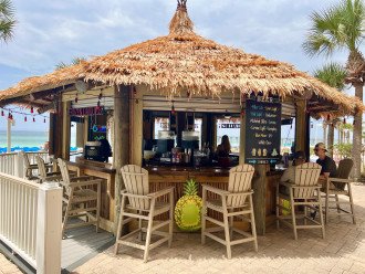 The Tiki hut is on your way to the beach walkway. Perfect for those of us that love the beach and a good beverage.