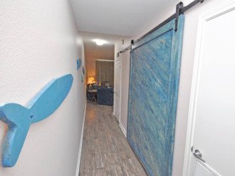 Barn door into bunk room & guest bathroom