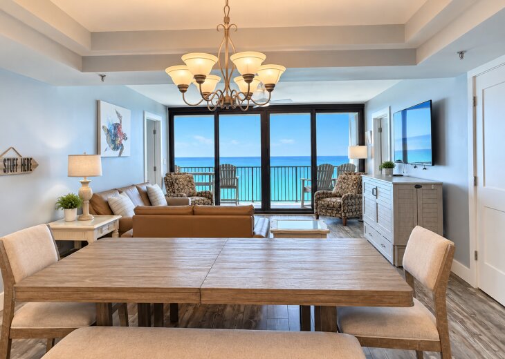 Wide dining table with plenty of seating and beautiful Gulf views.