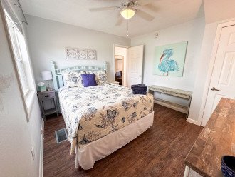 Queen bed with light/fan and closet for all your storage needs