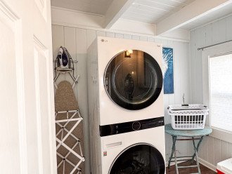 Laundry room with brand new W/D to freshen up towels & clothes during your stay!