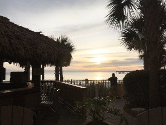 The Tiki bar is one of the many places you can enjoy watching the sunset.