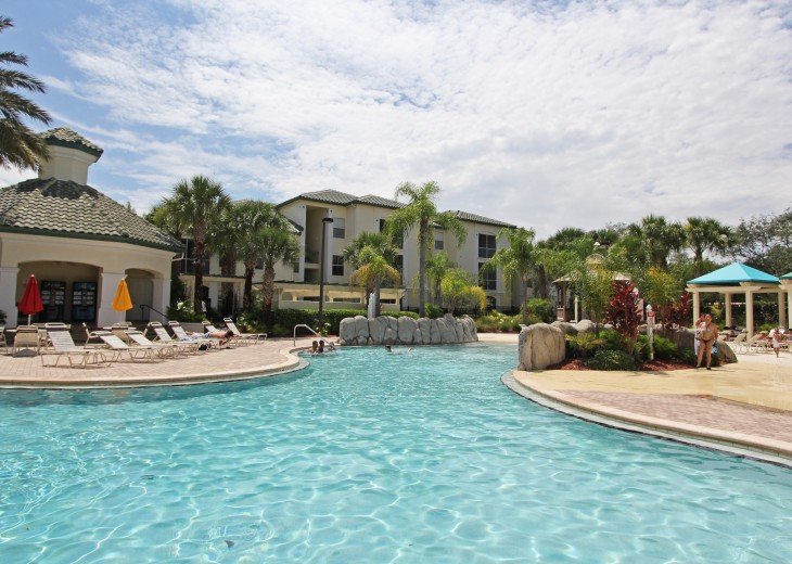 Tropical solar heated pool at Legacy Dunes with zero entry for kids