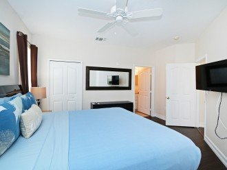 Master Bedroom with King Bed, 39" TV, en-suite bathroom, walk in closet