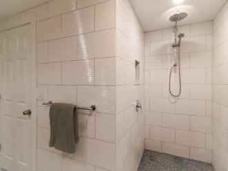 On suite bathroom 2 features a spacious rain shower