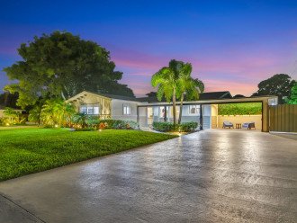 With ample lighting illuminating our home exterior and driveway, the nighttime ambiance welcomes you to our Delray Beach haven.
