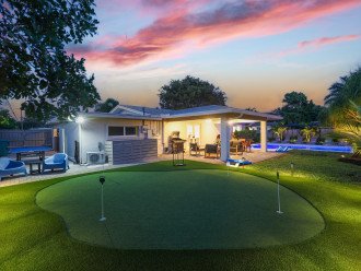 Practice your swing at our private putting green, with the pool, covered patio, and ping pong table nearby, ensuring endless fun