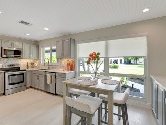 From the bistro area to the well-equipped kitchen, every detail is thoughtfully designed for convenience. With ample natural light streaming in through the expansive windows, cooking becomes a delight in our Delray Beach haven.