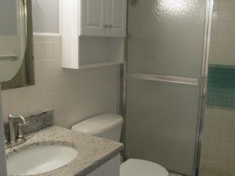 Full bathroom with stand up shower. NO Tub.