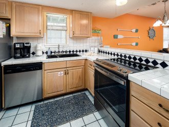 Large kitchen with stainless appliances
