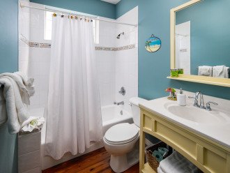 Guest bathroom with tub/ shower