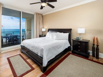 Master suite features King Size Bed and Balcony Access