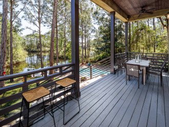 Back porch-dining table /view of lake/pool
