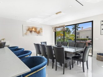 Dinning room in the ample open space living area offers canal views.