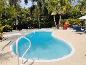 Relax in the heated pool while the kids play in the sand