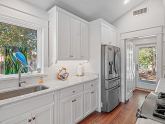 Kitchen with Laundry Room through the Open Door