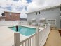 Swimming pool with child proof safety gate