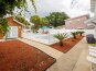 Fenced backyard with gated pool deck