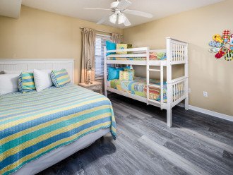 Guest room with bunks and full bed