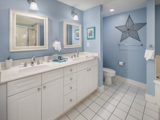 The large master bathroom has plenty of counterspace
