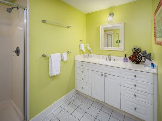 The guest bathroom has tons of counterspace for your family