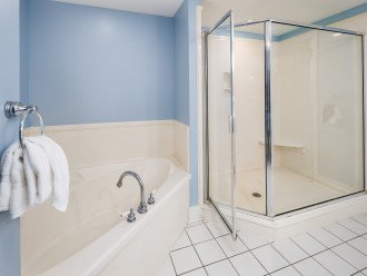 Walk in shower and large bathtub in the master bathroom