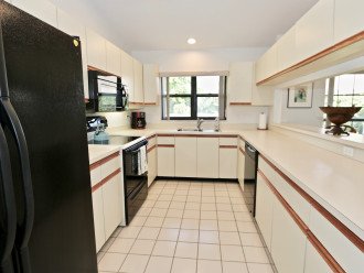 fully equipped kitchen with all you need to cook and serve meals