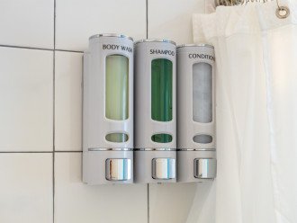 Each shower has body wash - shampoo - conditioner dispenser