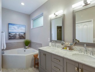 Master en-suite is all newly renovated with marble counter tops and soaker tub