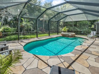 Plunge into this saltwater pool and enjoy a lush tropical landscape in privacy.