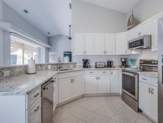 Brand new kitchen with Quartz counters and Kitchen Aid appliances