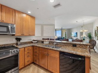 Everything you need is in this kitchen! Updated appliances make meal prep easy. Seating for 4 at the bar.