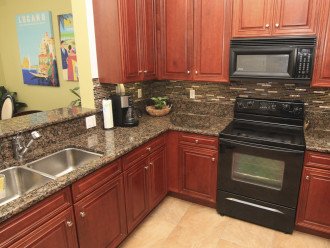 With a granite counter top and updated appliances this beautiful kitchen is perfect for preparing family meals.