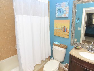 Guest bathroom with fresh, clean spa linens and towels.