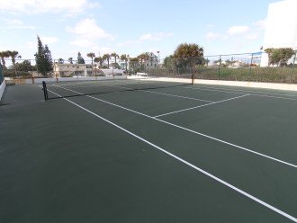 Tennis court located on the property.