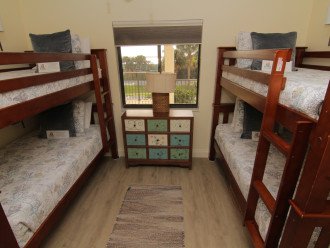 4 Twin Beds In the second Guest Bedroom.