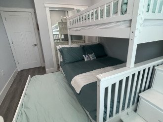 Bedroom 2 with a double bunk and pull out trundle.