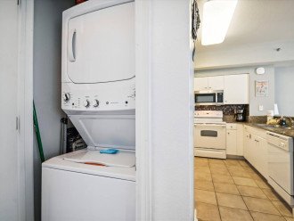 Convenient Washer and Dryer closet beside the kitchen