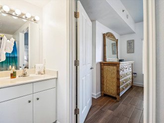 Master bath connecting to Master Bedroom with double vanities