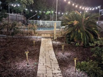 The backyard comes alive with the LED lights.