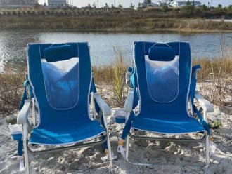 Beach chairs with sun shades are provided