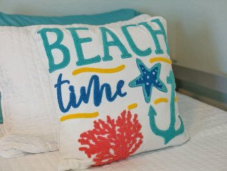 Tasteful beach decor thoughtfully placed throughout make the perfect accessories