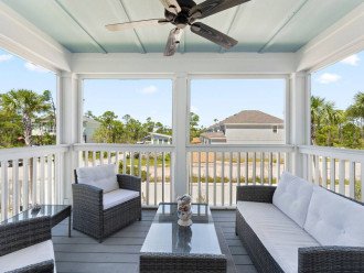 The front porch has a living area, where you can relax with a book or enjoy the view.