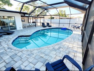 This large pool and spacious patio will make it hard to decide if you want to go to the beach or stay in.